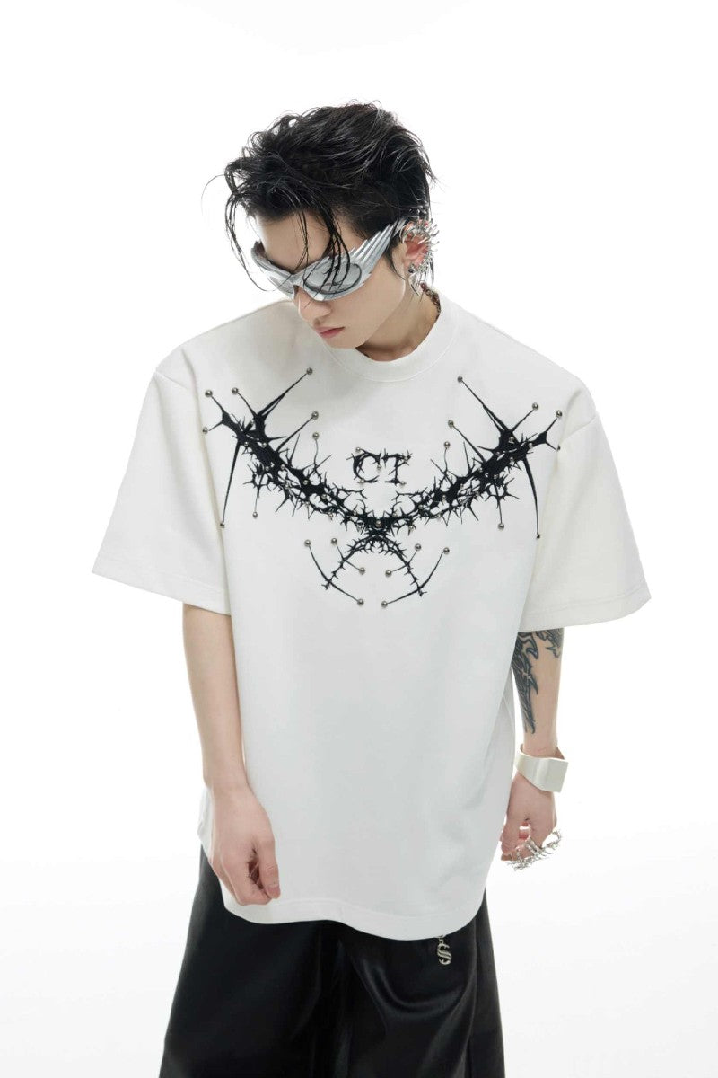 T-Shirt mit Distelstickerei und Nieten