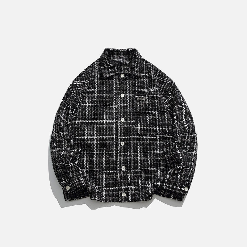 Chemise oversize noire à patchs de couleur.