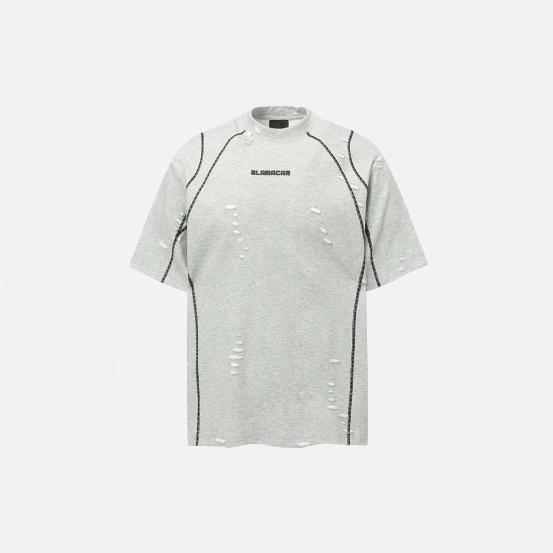 T-shirt grunge à trous déchirés