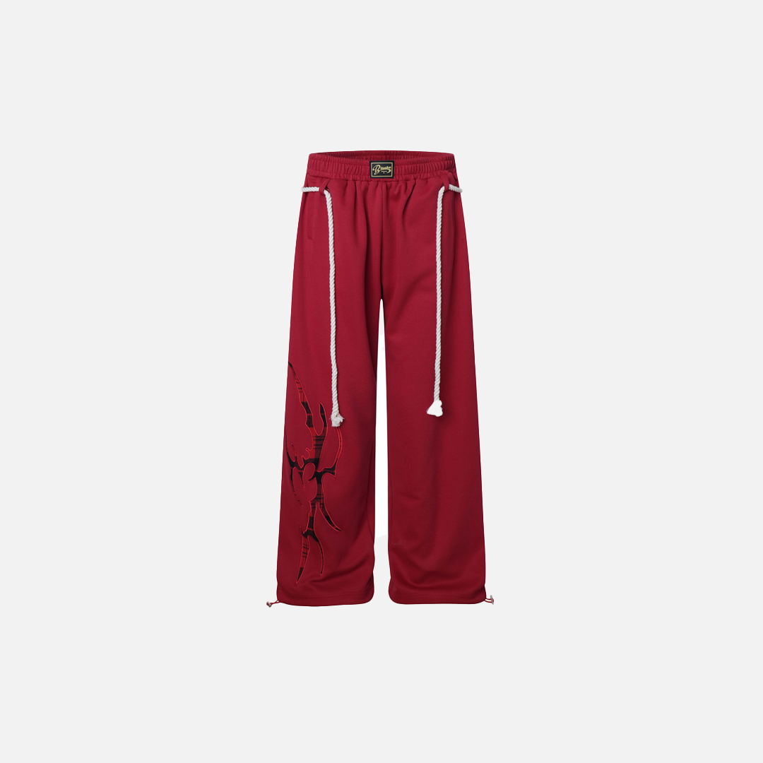 Jogger mit weitem Bein und kreativem Design aus rotem, gewebtem Seil