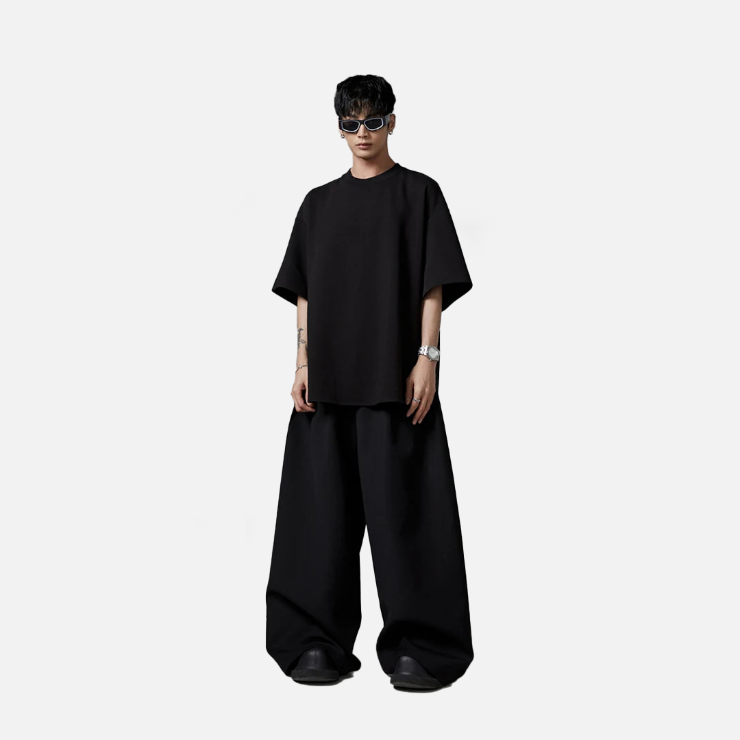 Fließende schwarze Oversize-Hose mit weitem Bein