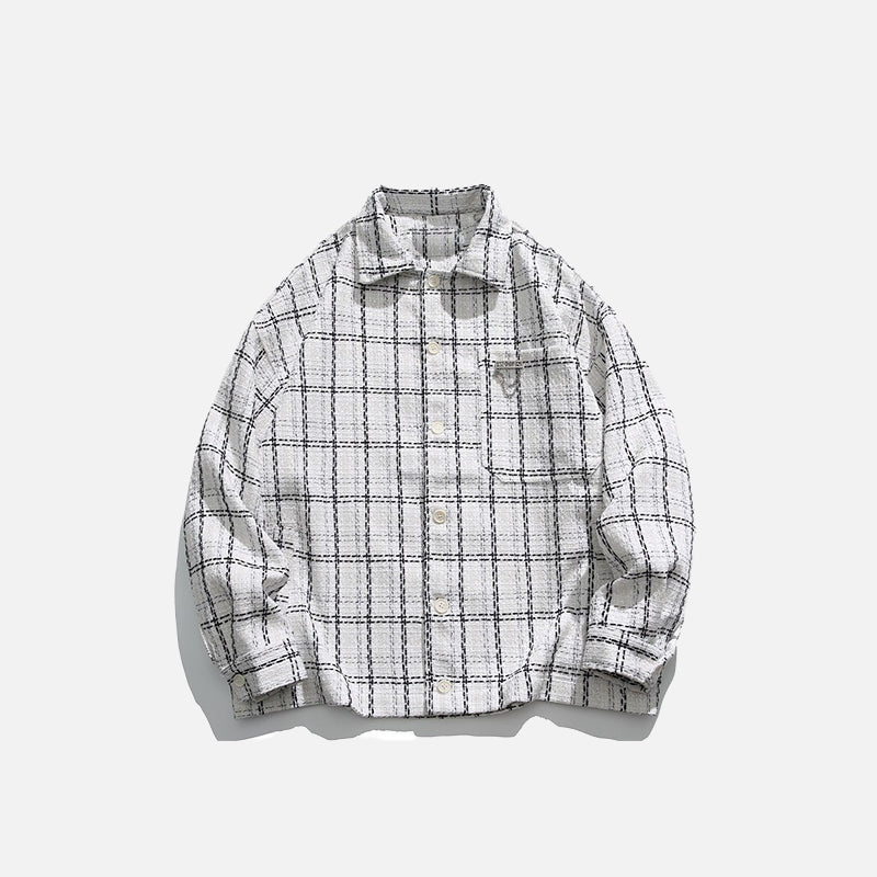 Chemise oversize noire à patchs de couleur.