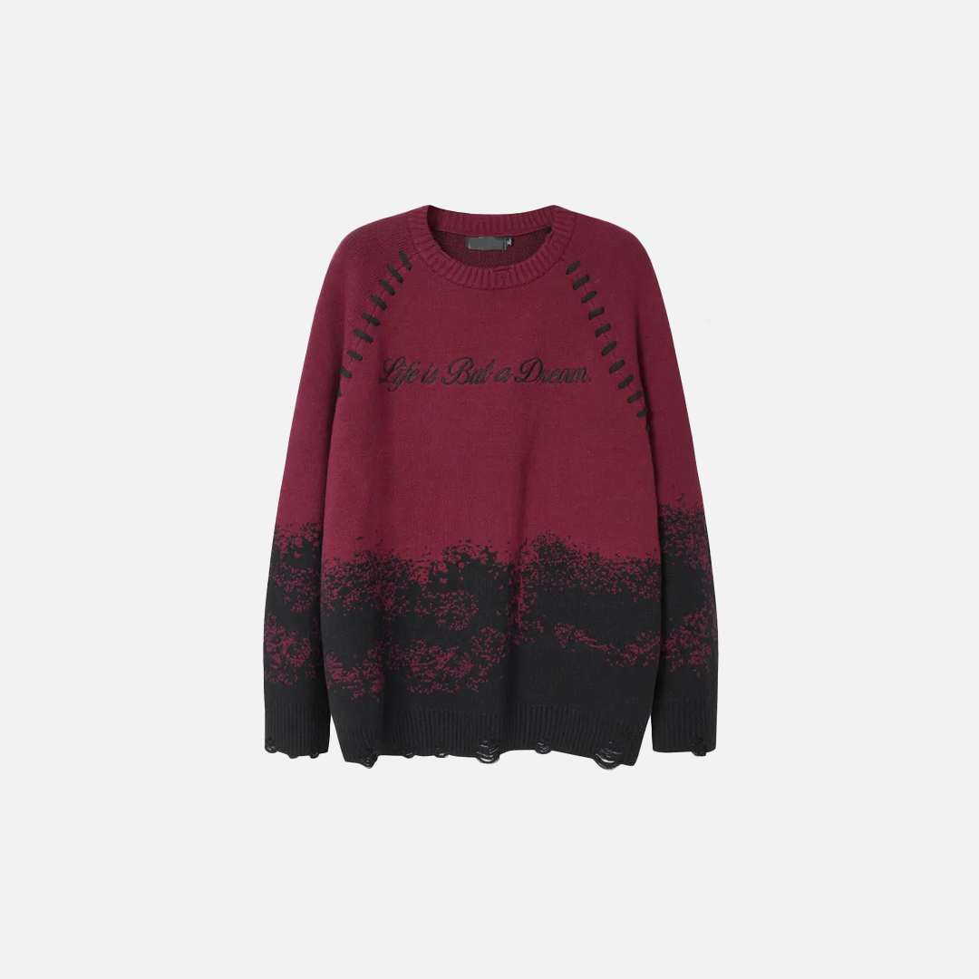 Pull déchiré brodé style grunge