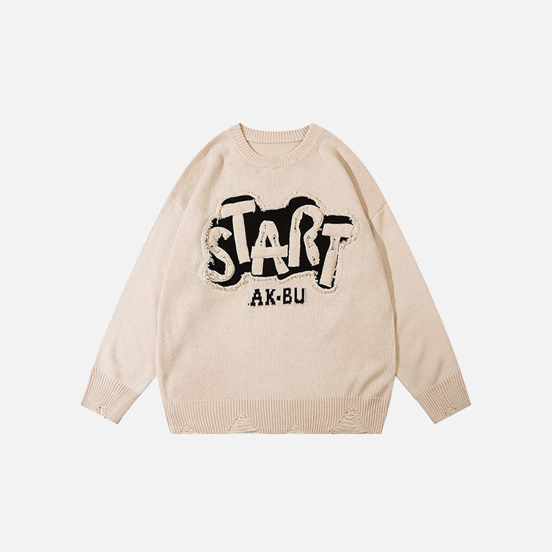 Pull brodé avec la lettre « Start »
