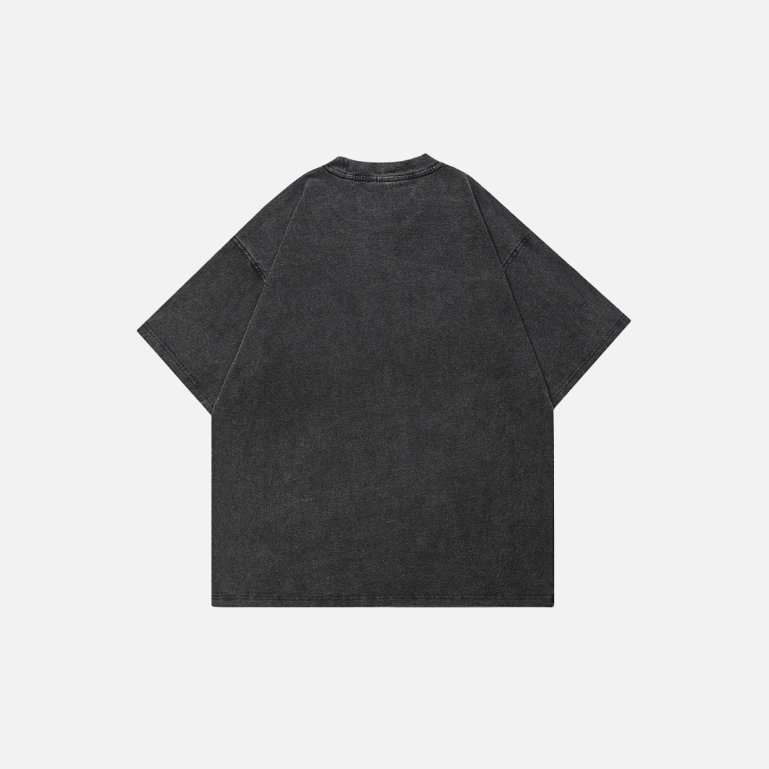Verwaschenes schwarzes T-Shirt mit lustigem grünen Gesicht