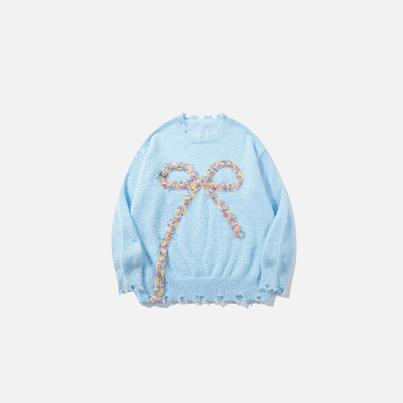Pull orné d'un nœud papillon
