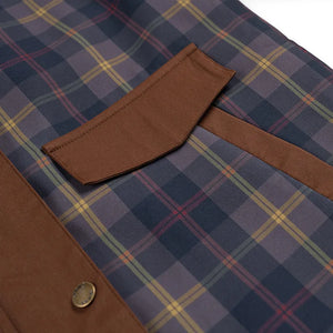 Elevate your rotation with this vintage-inspired plaid workwear jacket, featuring bold contrast panels and a classic tartan check for a standout look.
