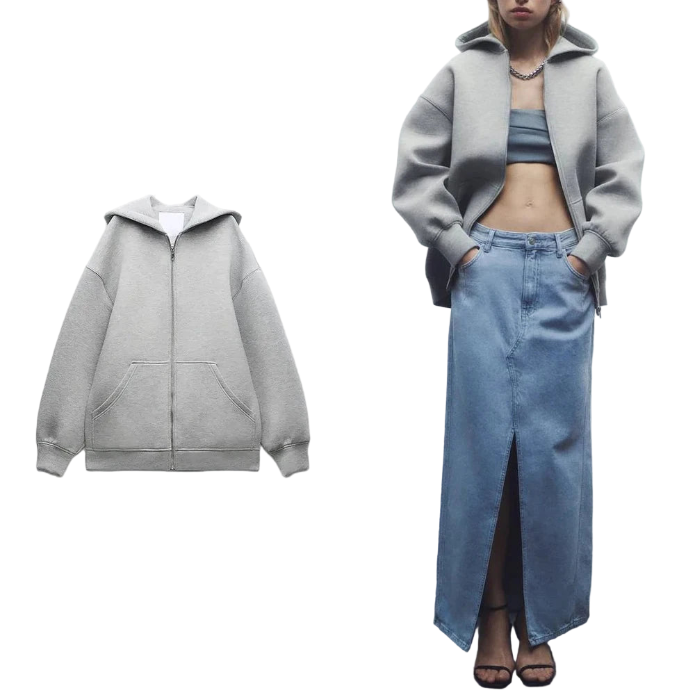 Upgrade your casual wardrobe with this oversized grey zip-up hoodie, featuring a relaxed drop-shoulder fit and ultra-soft fabric for effortless everyday style.