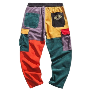 Colorful patchwork pants with a brand logo on a white background