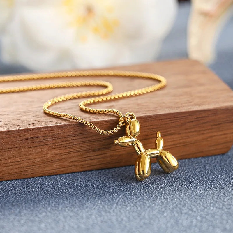 Collier pendentif chien ballon doré mignon