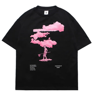 Black t-shirt with pink cloud and person graphic design on a white background