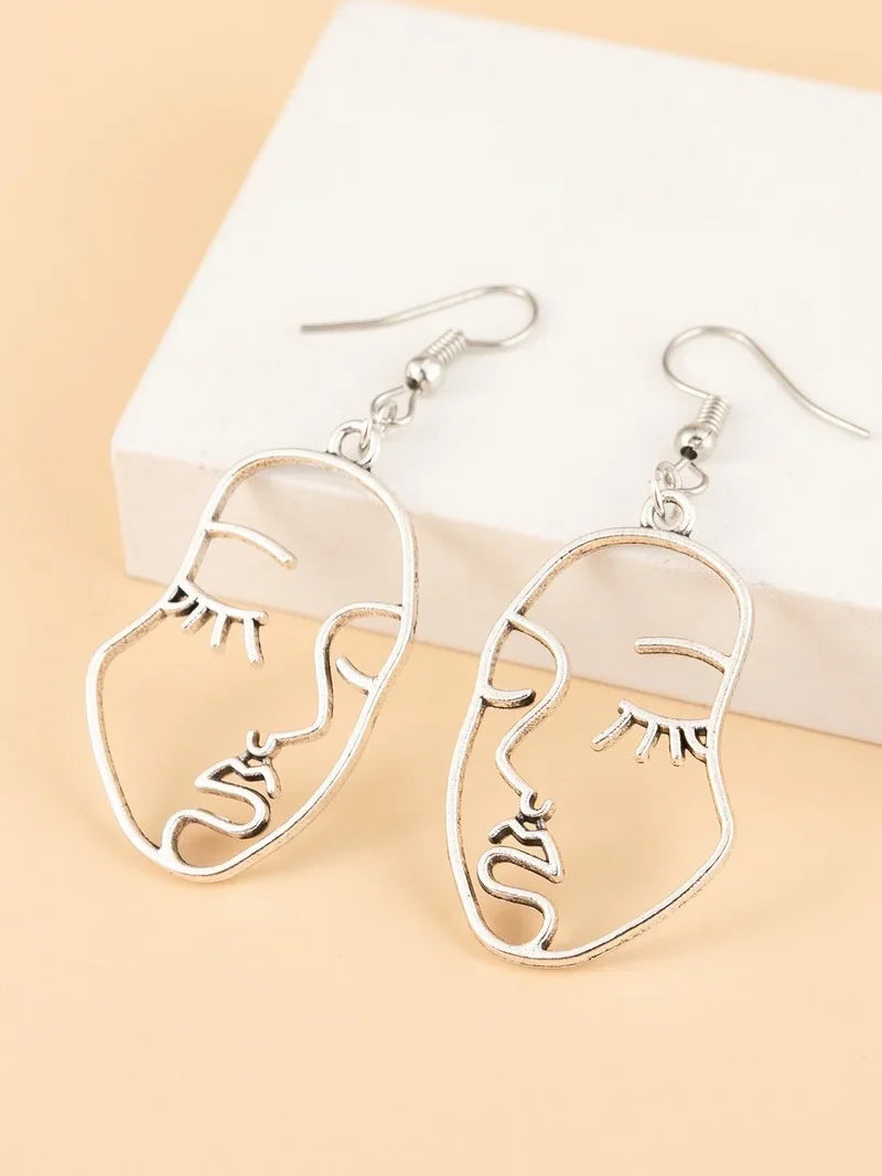 Gold Abstract Hollow Out Face Earrings