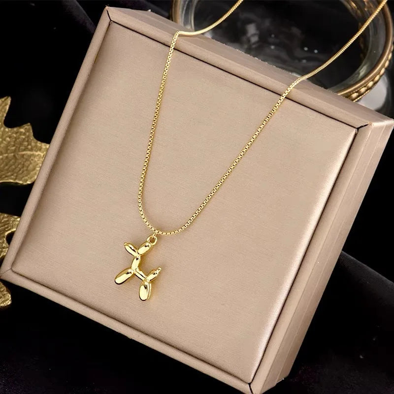 Collier pendentif chien ballon doré mignon