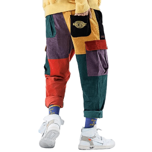 Colorful patchwork pants with a brand logo on a white background