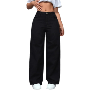 Person wearing black wide-leg pants and a white crop top against a gray wall.
