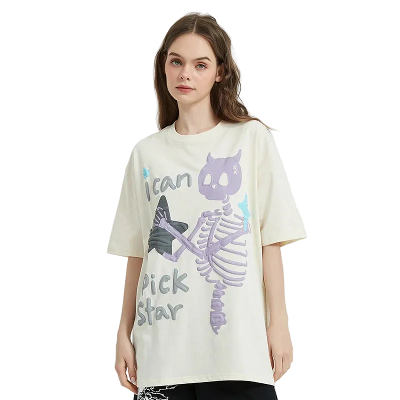 Woman wearing a cream t-shirt with a graphic design on a white background