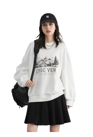 Person wearing a white sweatshirt with a graphic design and text, black skirt, and black cap on a light gray background