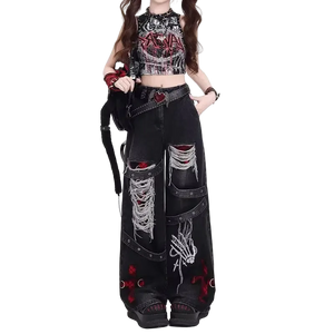 Person wearing a black outfit with red and white designs on a white background