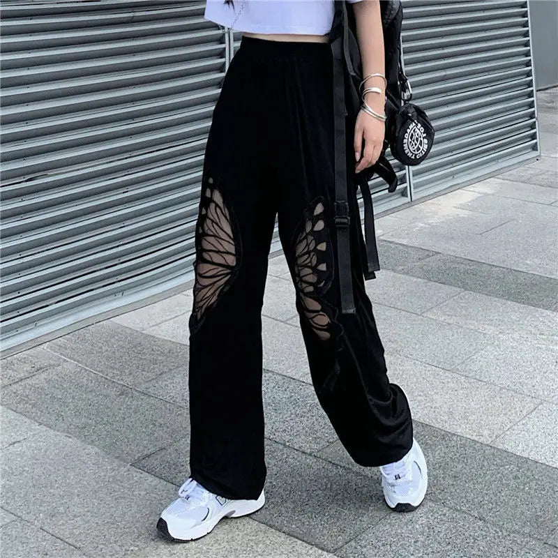 Schwarze Damenhose mit Schmetterlingsmuster