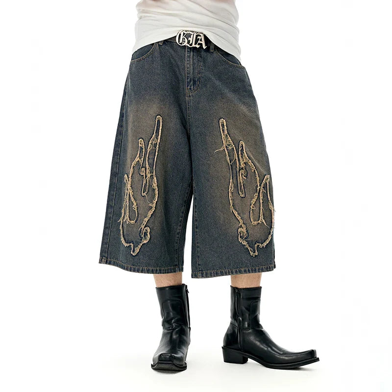 Short en jean à chaîne tendance