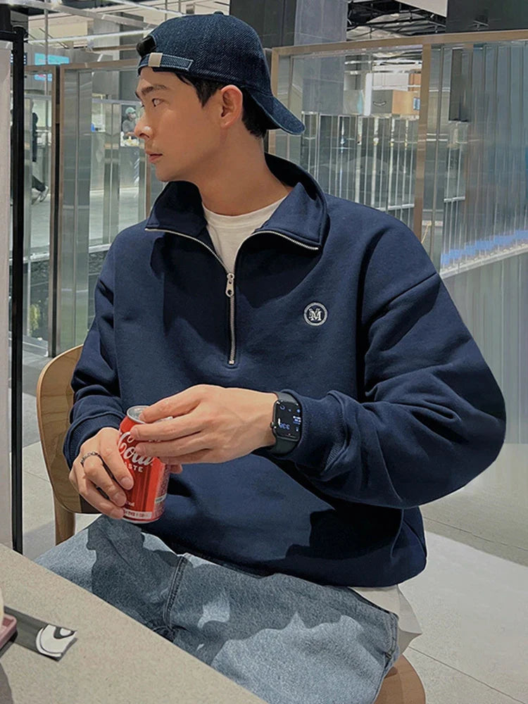 Sweatshirt mit Viertelreißverschluss und Umlegekragen