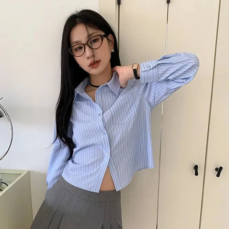 Chemise classique chic à rayures bleues à manches longues pour femme