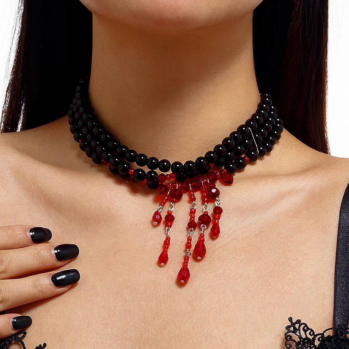 Collier à pompon en perles d'imitation à motif sanguin