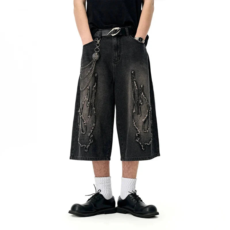 Short en jean à chaîne tendance