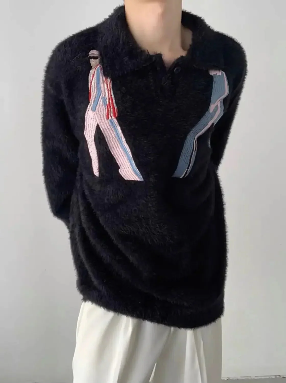 Kuscheliger bestickter Nerzdaunenpullover