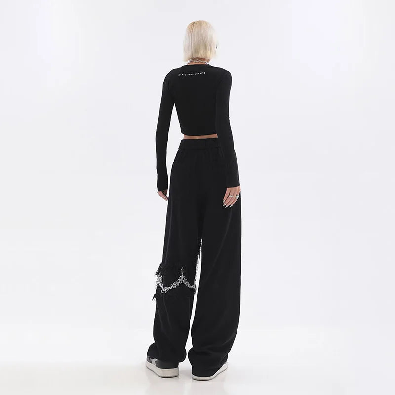Schwarze Oversize-Streetwear-Hose mit Kette im Hip-Hop-Stil