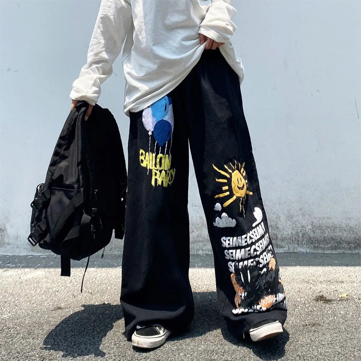 Oversize-Hose mit Y2K-Graffiti-Print und weitem Bein
