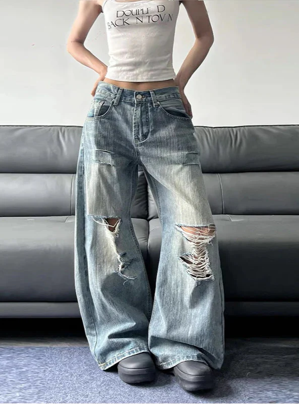 Strapazierfähige Y2K High Waist Jeans mit Rissen und weitem Bein in Blau