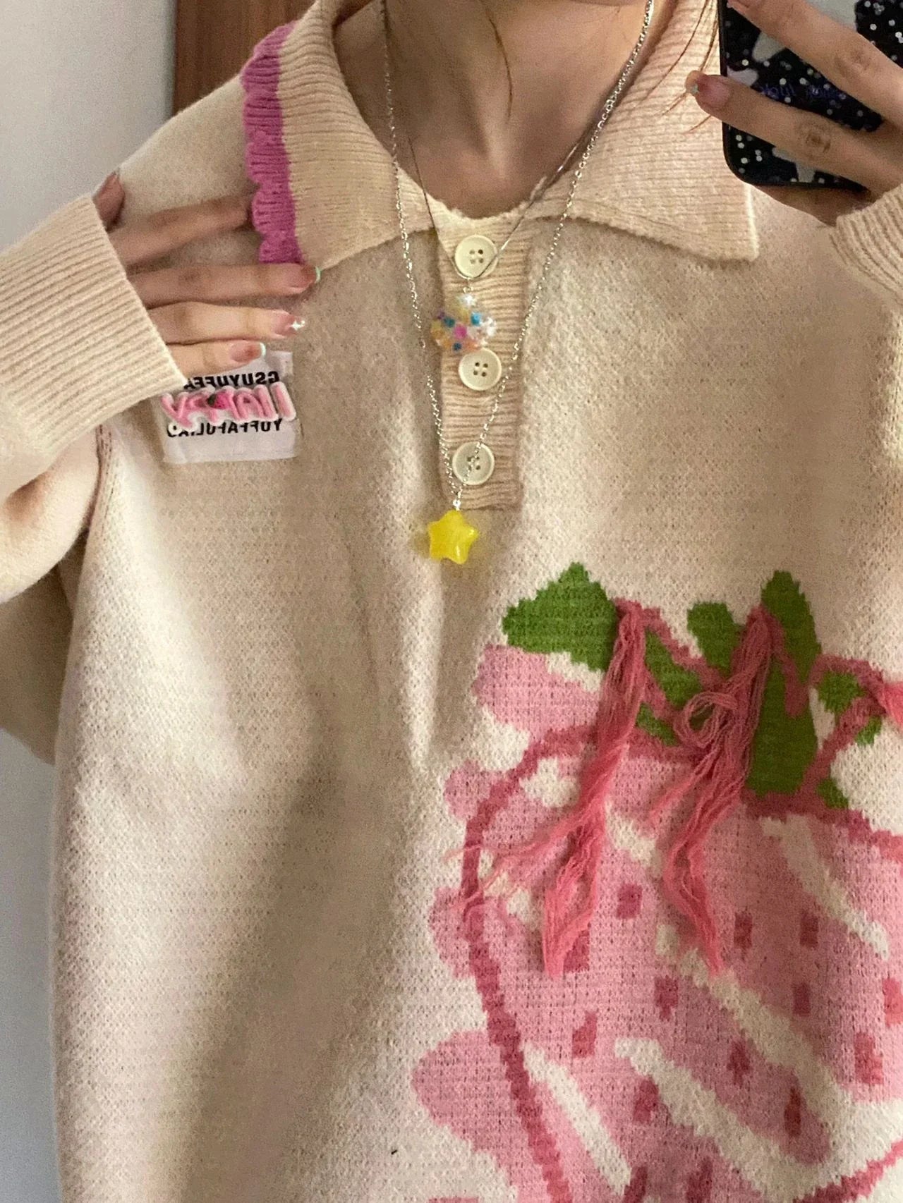 Pull fraise en maille lâche et mignonne