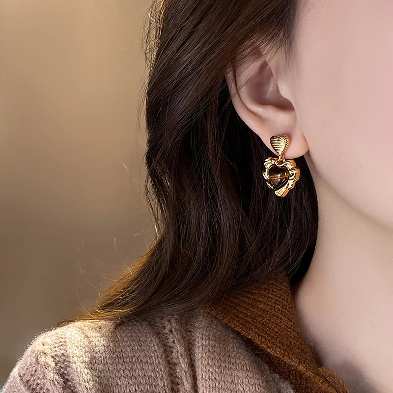 Boucles d'oreilles exquises en forme de cœur et œil de tigre