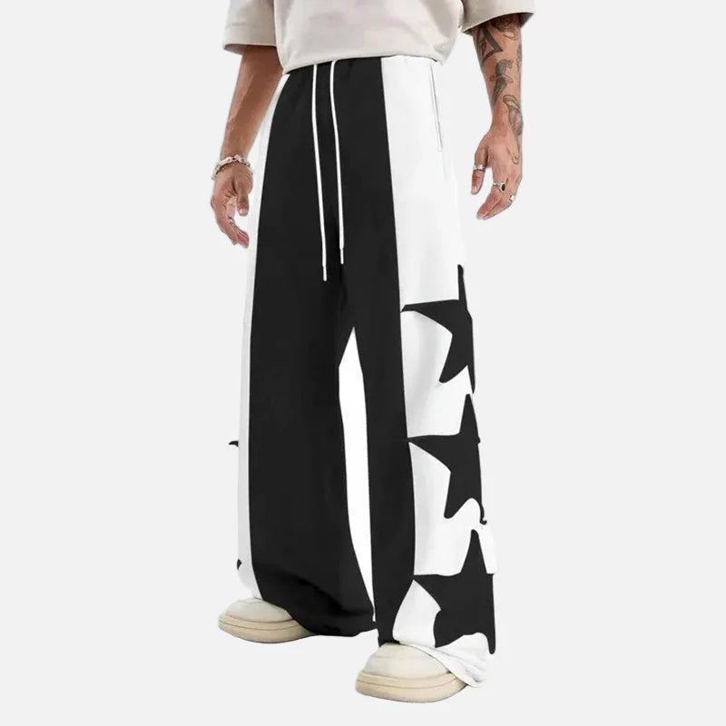 Pantalon de survêtement large à empiècements et blocs de couleur avec étoiles