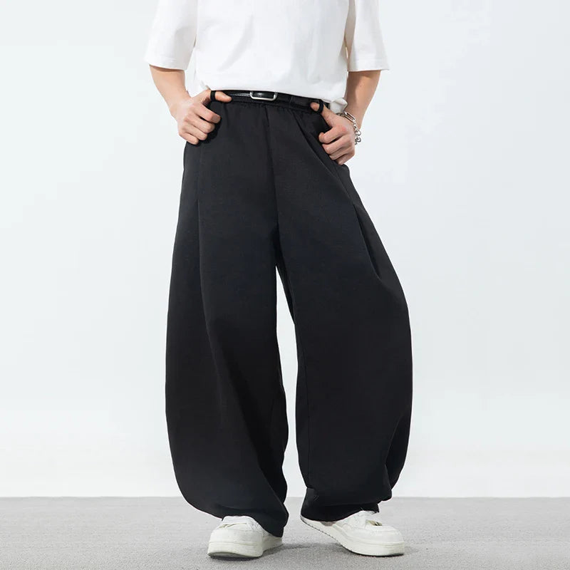 Klassische, plissierte Hose mit Kordelzug und weitem Bein