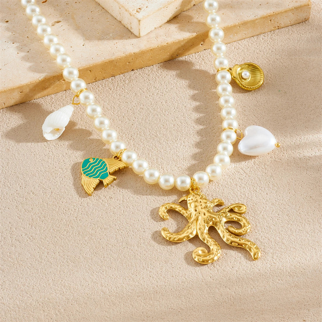 Collier pendentif en forme de cœur de pieuvre dorée et perle