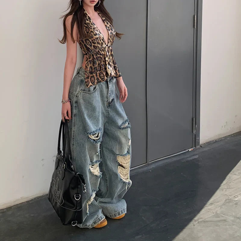 Jean extensible adaptatif à taille haute déchiré