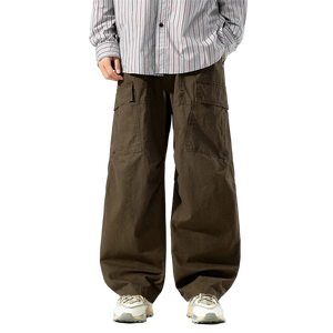 Person wearing brown cargo pants and a striped shirt on a white background