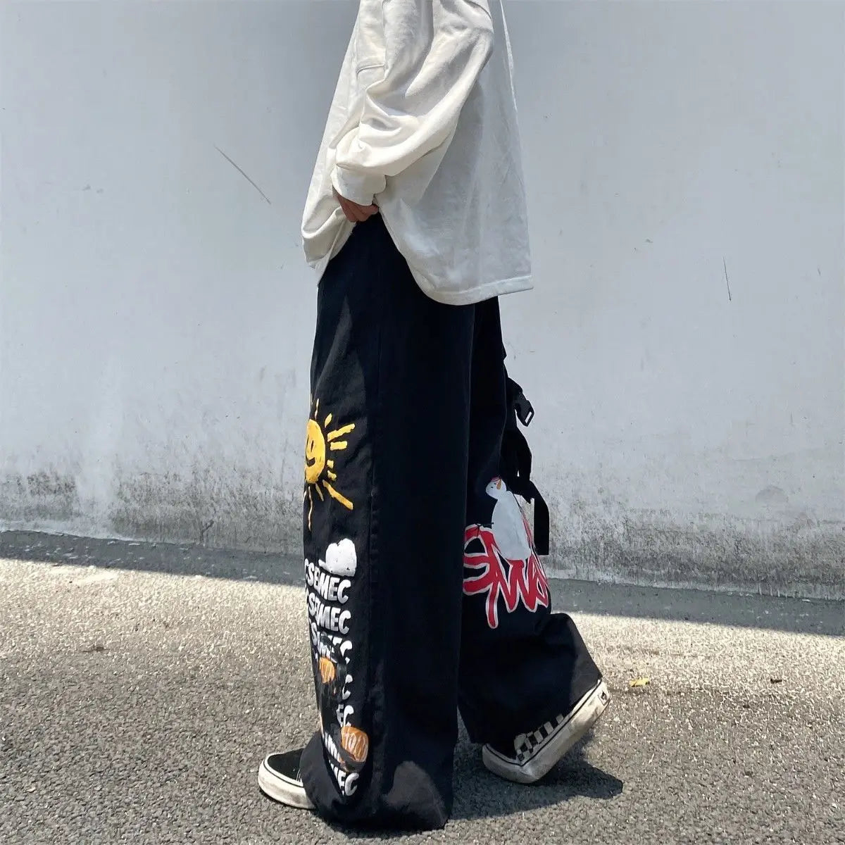 Oversize-Hose mit Y2K-Graffiti-Print und weitem Bein