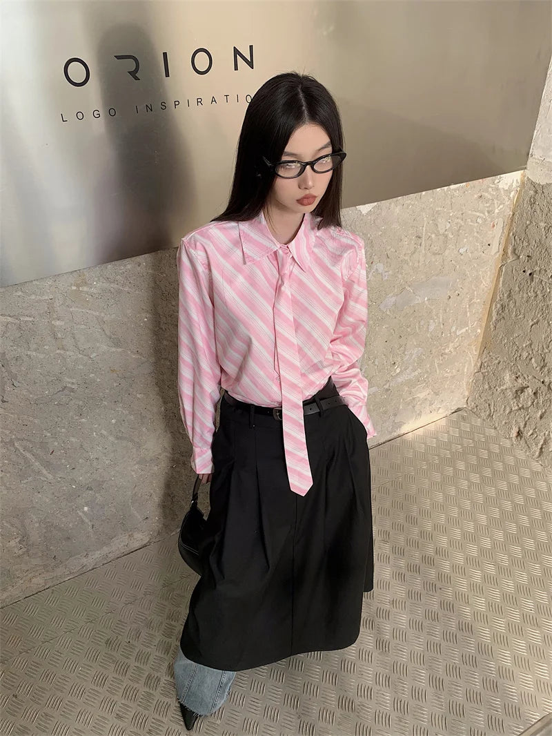Chemise rose à rayures boutonnée pour femme