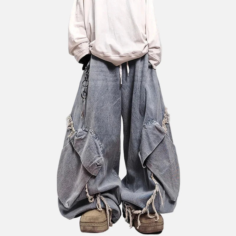 Minimalistische Jeans mit elastischem Bund, Falten und weitem Bein
