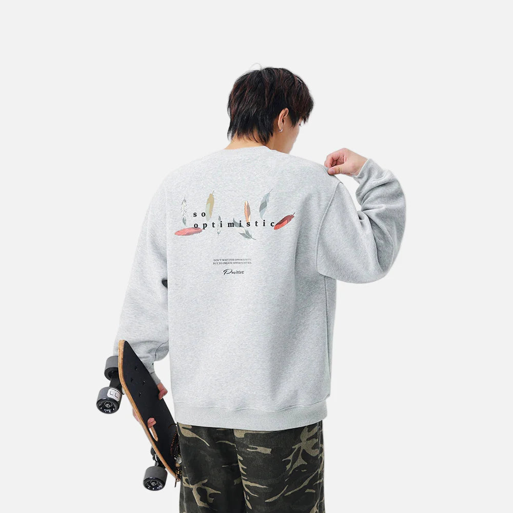 Gemütliches Sweatshirt mit Federmuster und Buchstabenprint