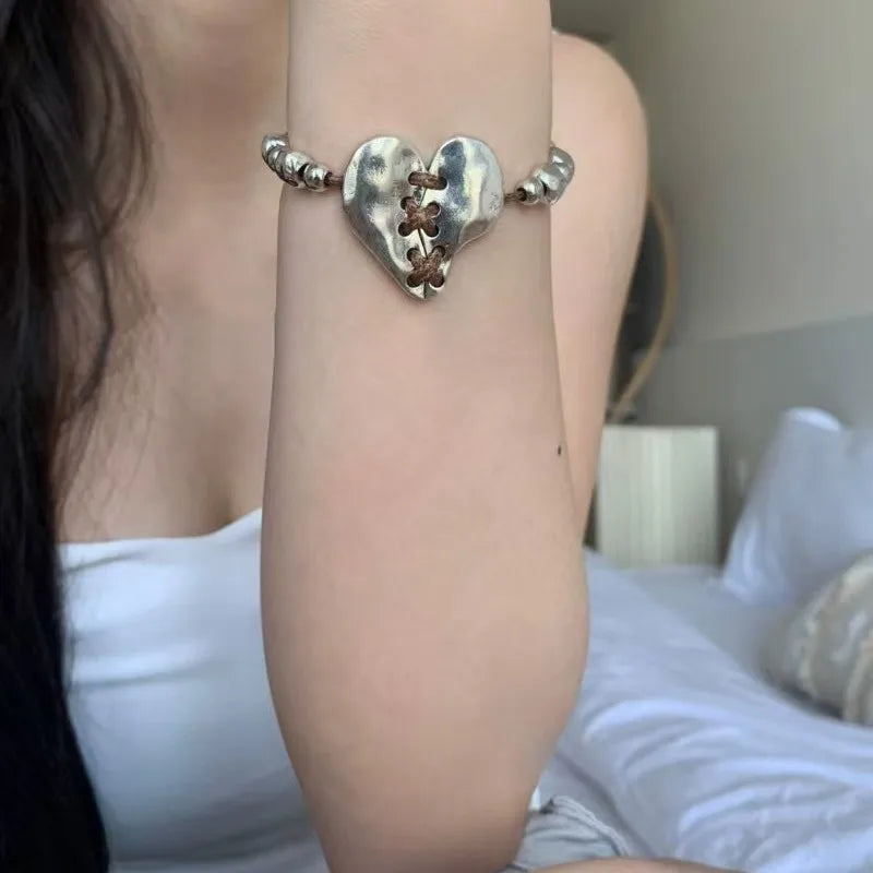 Bracelet punk ajustable en forme de cœur argenté