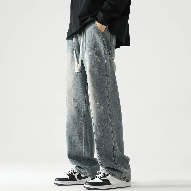 Lässige Jeans mit weitem Bein und Kordelzug im Used-Look