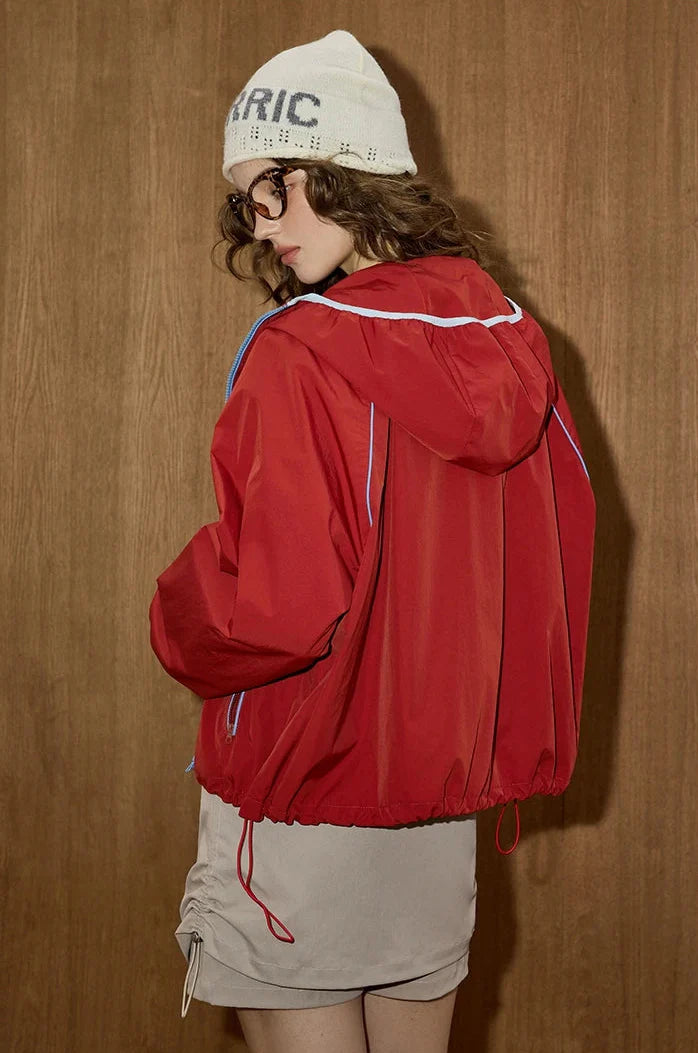 Veste coupe-vent sportive à capuche confortable