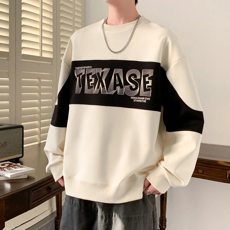 Buntes Sweatshirt mit Patchwork-Buchstabenprint und Rundhalsausschnitt
