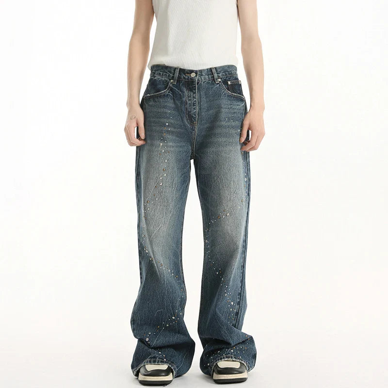 Pailletten-Patchwork-Jeans mit abgenutztem Saum und Maserung