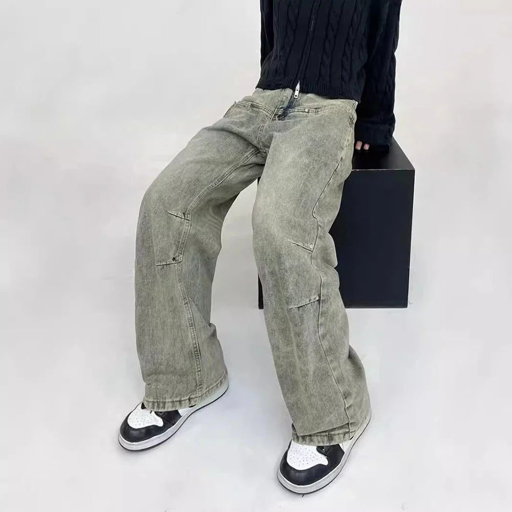 Vintage gelbe, abgenutzte Arbeitsjeans