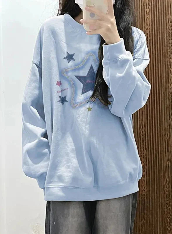 Mühelos eleganter blauer Pullover im Preppy-Stil mit Sternenprint